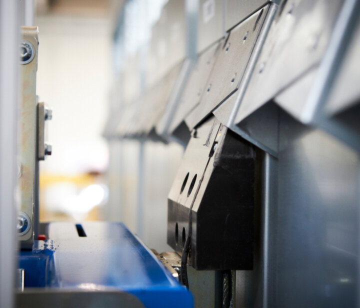 close-up picture of a gripper attaching a cassette in a storage from bcm